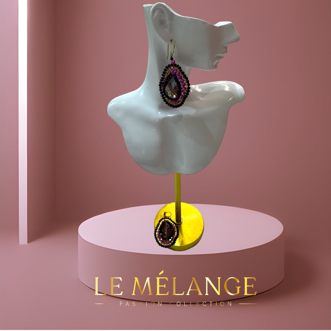 Le Mélange Luxe earrings adorned with multiple colored crystals.