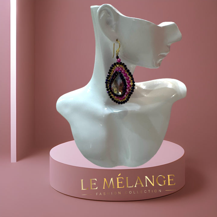 Le Mélange Luxe earrings adorned with multiple colored crystals.