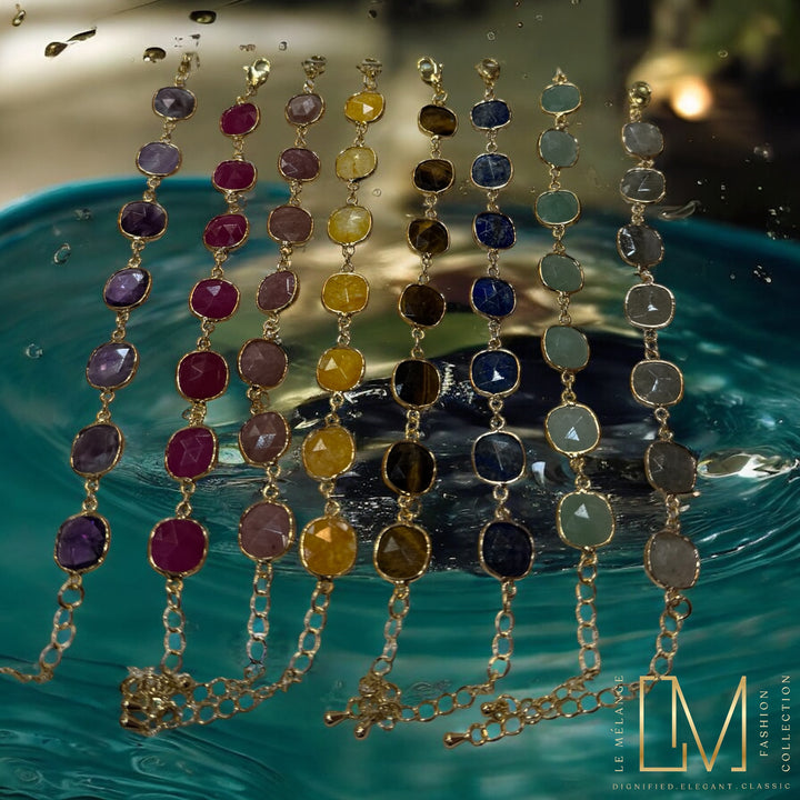 Gold-plated bracelets with gemstones.