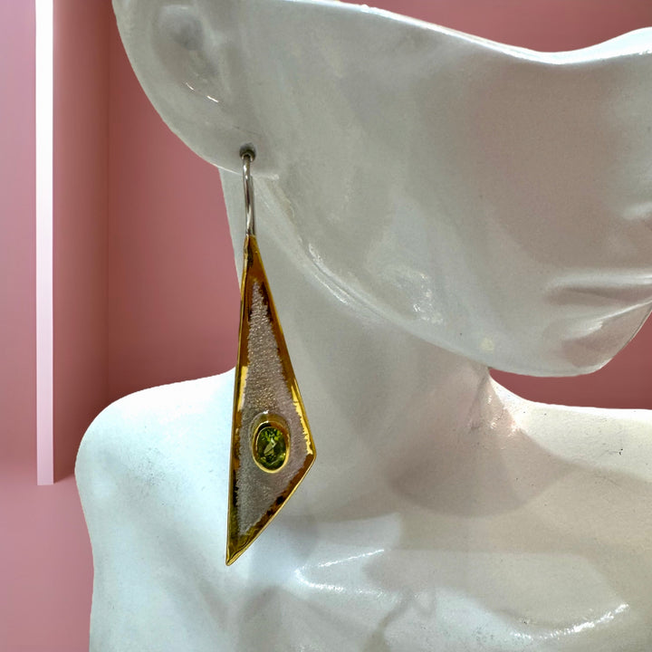 Artisan geometric silver and 24 karat overlay gold earrings with a "" gemstone.