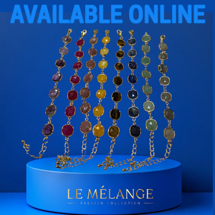 Gold-plated bracelets with gemstones.