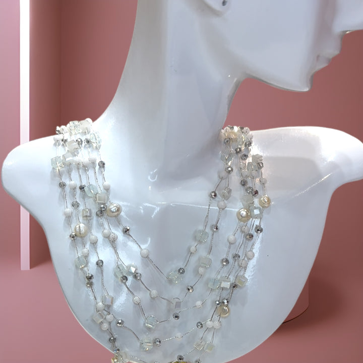 Intricate white semi-precious stone silk necklace